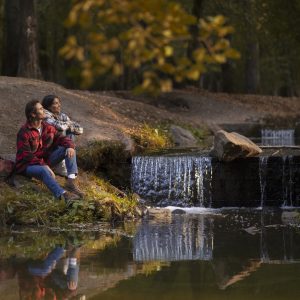 Autumn Riverside Couple Moment
